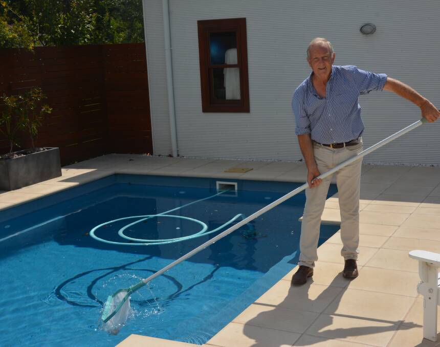 ALWAYS CAUTIOUS: Mike Pritchard next to his backyard pool in Scone on Tuesday afternoon.