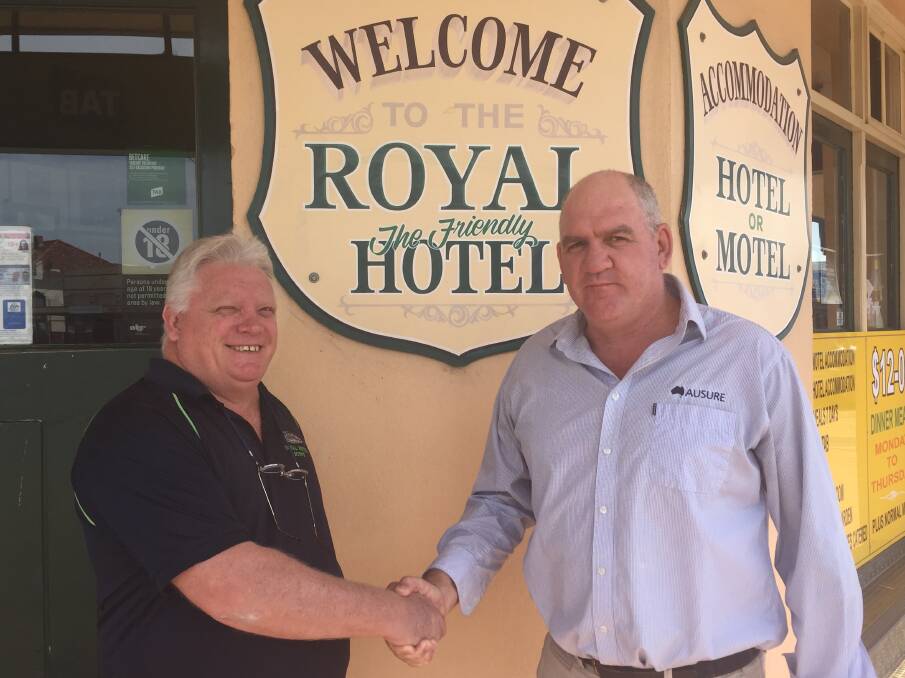 GREAT SUCCESS: Royal Hotel publican Ian Campbell with 'Where There's A Will' chairman Jason Brooks.