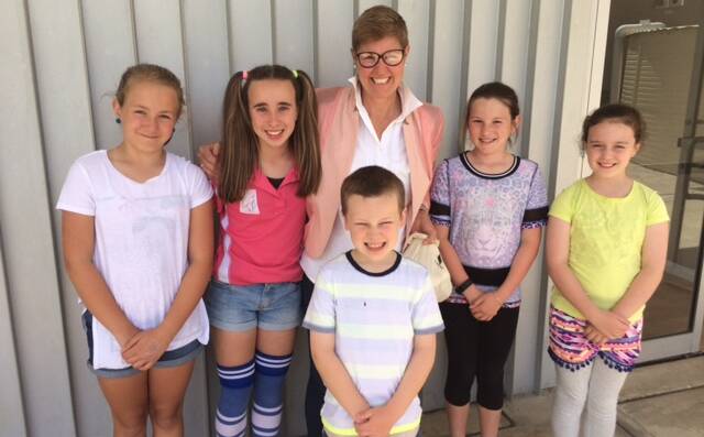 GROUP EFFORT: 'Where There's A Will' founder Pauline Carrigan with students from St Mary's Primary School, Scone, during a movie day fundraiser.