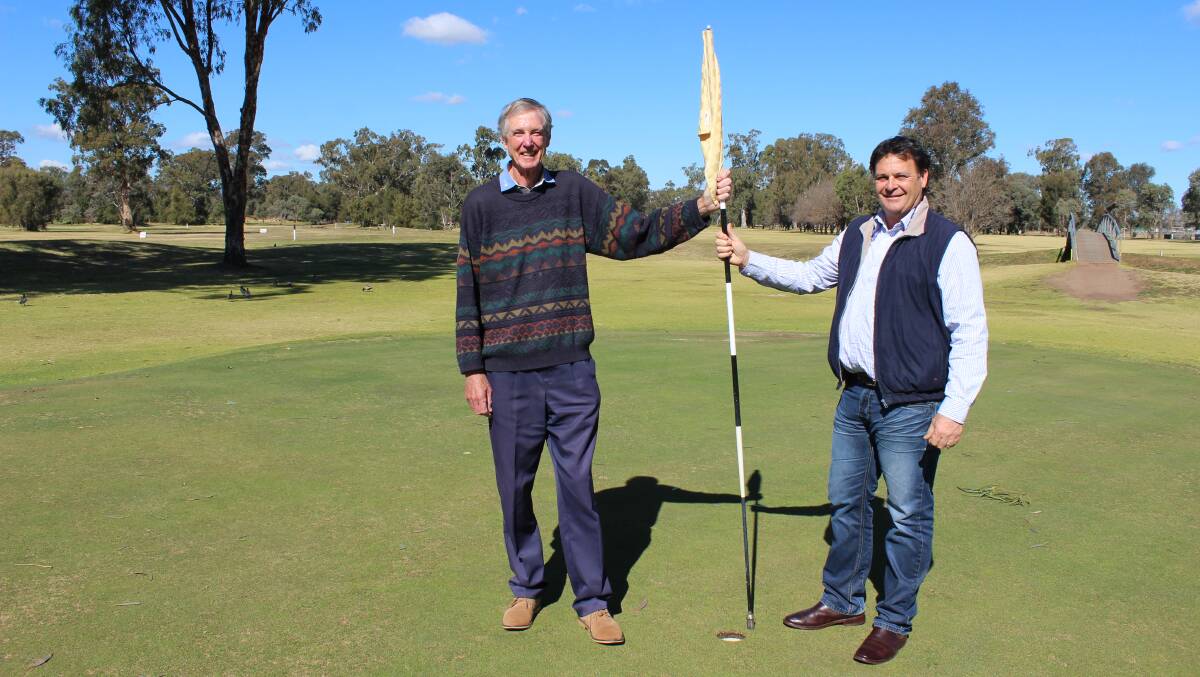 TEEING OFF: Scone Golf Club president Gordon Halliday and Upper Hunter Shire mayor Wayne Bedggood at Scone Golf Course, which will be redesigned to make way for the Scone Bypass.