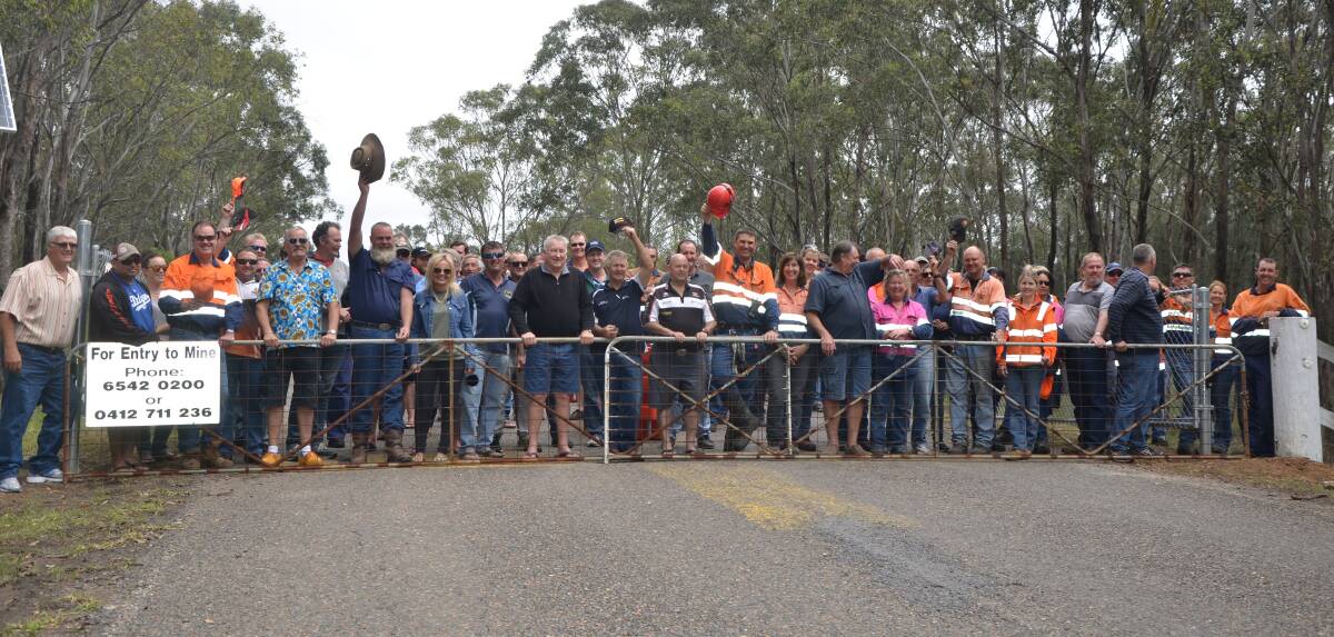 SAD DAY: Drayton Mine employees at the company's gate-shutting ceremony on Friday.
