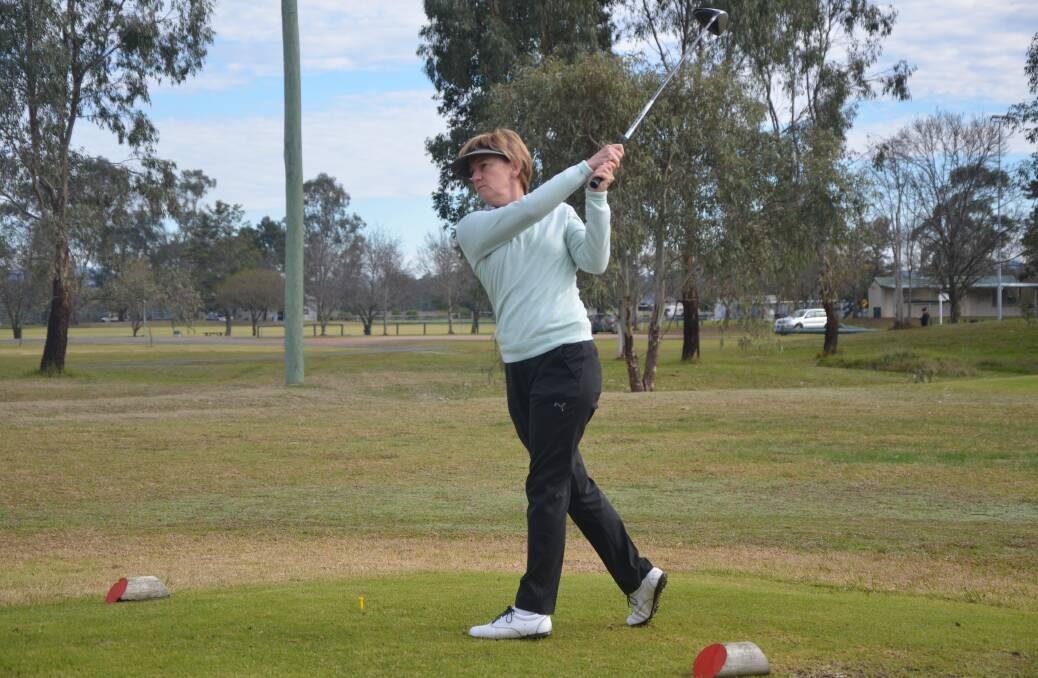 FORE: Lyn Banks tees off at the first hole during the foursomes championships at the Scone Golf Club on Thursday.