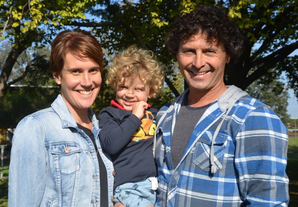 TAKING EACH DAY AS IT COMES: Angela Oversby with son Cooper and husband Kevin.