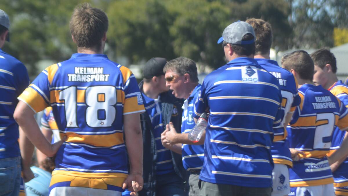 TEAM TALK: Muswellbrook Rams coach Paul Benkovic laws down the law to his charges at half-time.