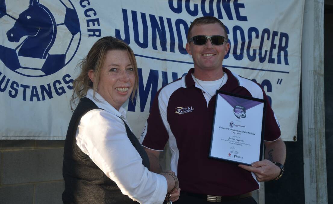 Newcastle Permanent’s Muswellbrook-Scone branch manager Vanessa Muddiman and Scone Mustangs Football Club’s Joshua Rumsby 