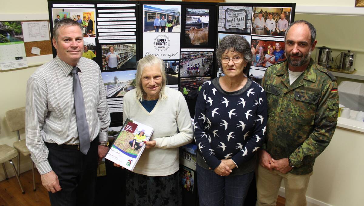 DETAILED FUTURE: Upper Hunter Shire Council’s general manager Waid Crockett and Cr Lorna Driscoll spoke with new residents Robyn and Glenn Brew at the Murrurundi DPOP public meeting.