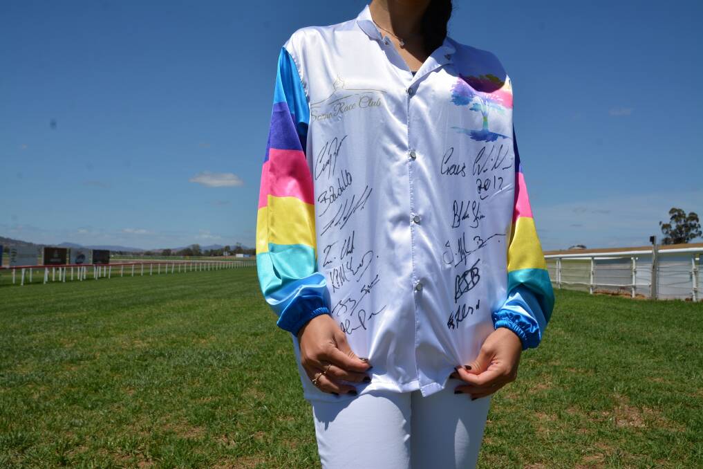 Signed silks up for auction