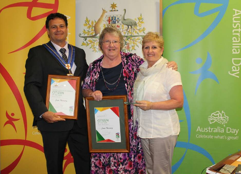 Mayor Wayne Bedggood presents the Citizen of the Year Award to Joan Manning at the 2017 Upper Hunter Shire Australia Day Ceremony.