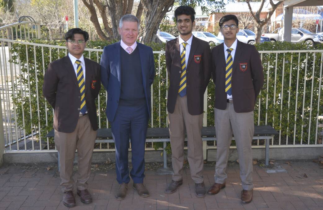 WELCOME: Scone Grammar School principal Paul Smart welcomes students from Welham Boys’ School in India, Kunden Jindal, Mudhan Tulsyan and Vandit Khandelwal.
