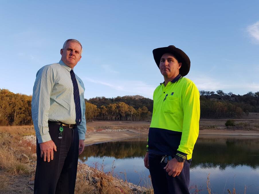 SITUATION DIRE: Upper Hunter Shire Council General Manager Steve McDonald and Murrurundi Town Water Supervisor James Davis at Murrurundi Dam.