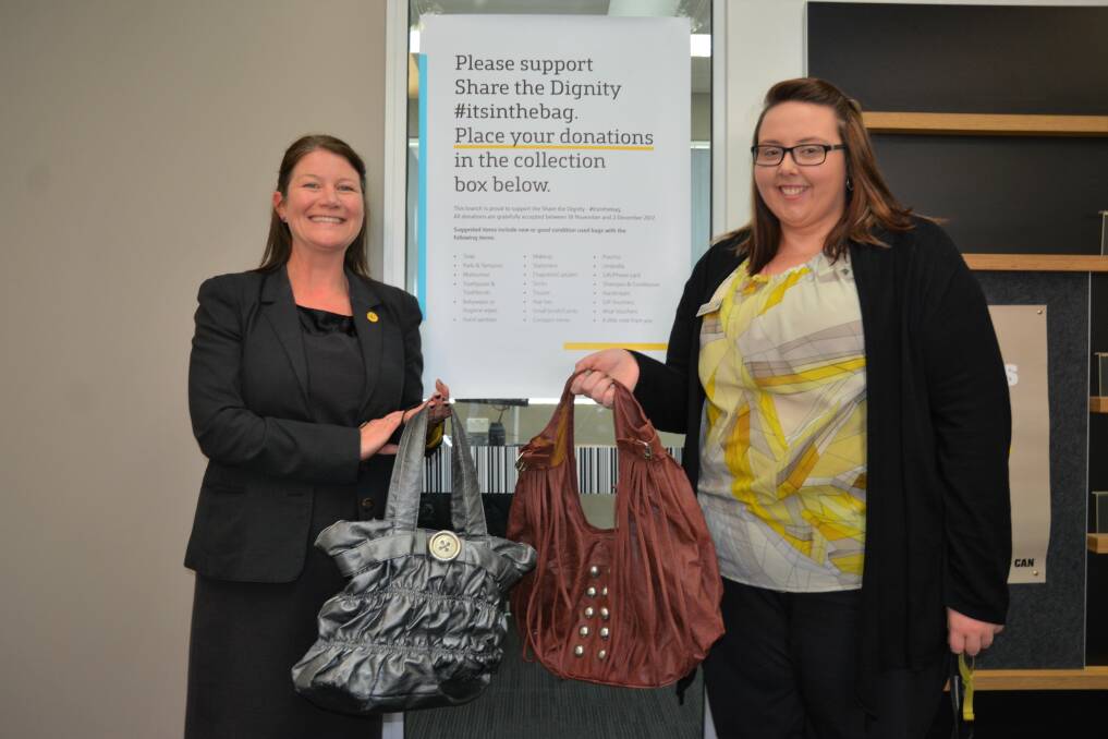 SUPPORT FOR WOMEN IN NEED: Kylie Honeyman and Branch Manager of Commonwealth Bank Scone Emma Keaton.