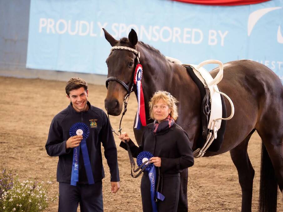 WINNER: Jamie Hocking winner of the 3 star male with lunger Robyn Boyle and Hunterview Sinatra at the Sydney International Equestrian Centre. Picture: Supplied.