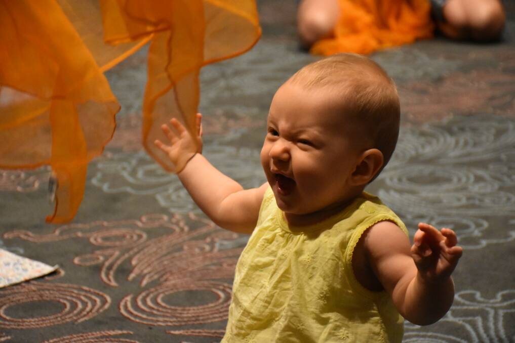 A baby and parent music class, for newborns to 12 months, featured some very happy 