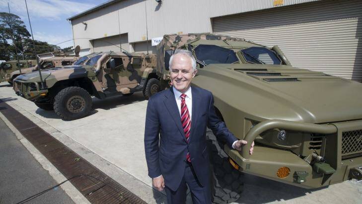 Mr Turnbull with one of the new Hawkei vehicles. Photo: Simon O'Dwyer