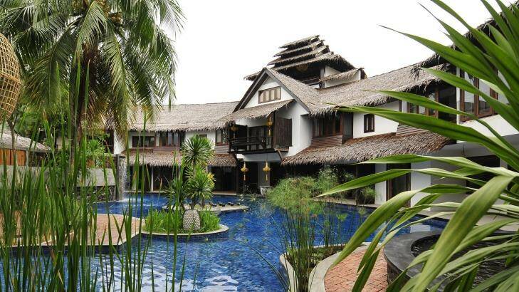 Rooms overlooking the lagoon-like pool at Villa Samadhi, Kuala Lumpur, Malaysia.