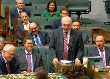 FOND FAREWELL:  Retiring Deputy Prime Minister and Leader of the Nationals, Warren Truss, addressing Parliament on Thursday.