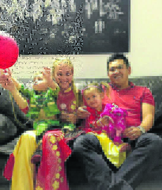 Lucy and Truong Vu Nguyen with their two children Francis (left) and Anastasia who love to call Murrurundi home. 