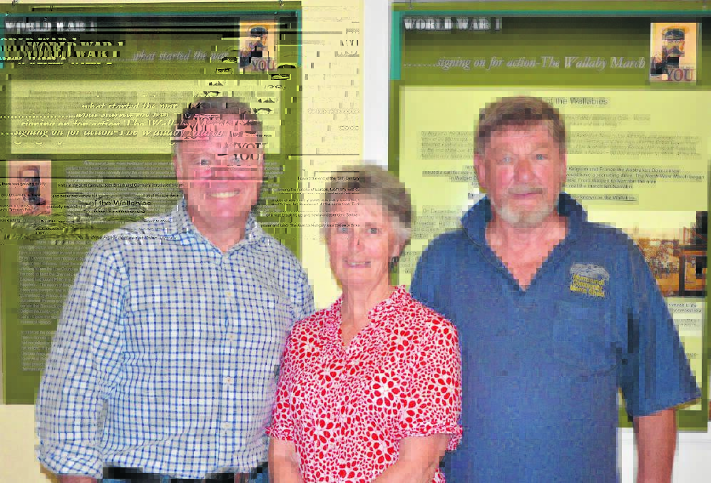 Member for Hunter Joel Fitzgibbon with Murrurundi and District Historical Society secretary Jenny Loasby and president Des Dugan and some of the storyboards that feature in the First World War exhibition. 