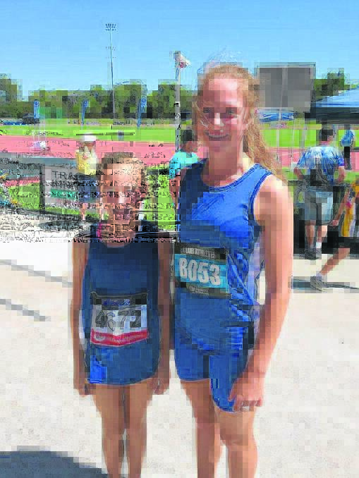 Scone athletes Tyla Brown and Mikaela Tilse at the Country Championships at the Hunter Sports Centre last week.