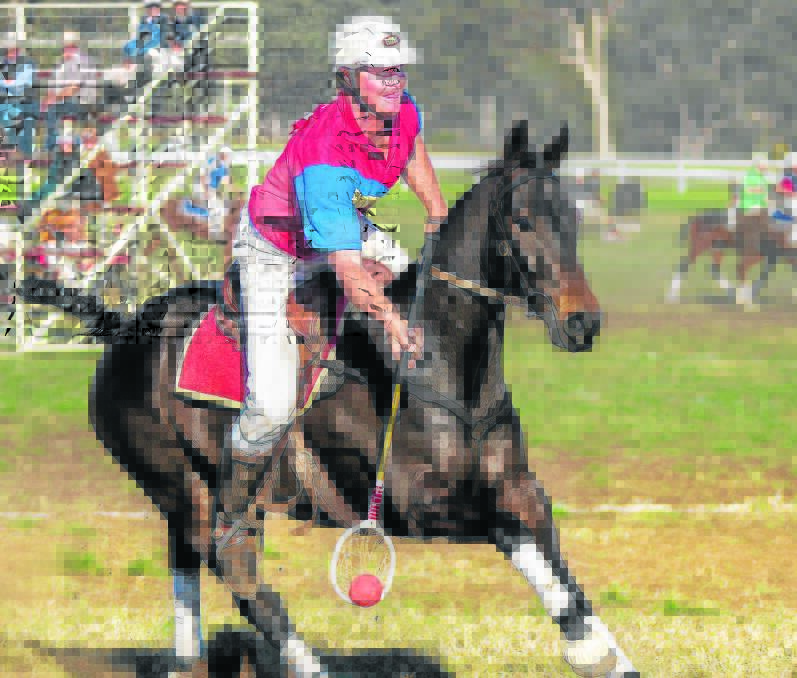 Bunnan Polocrosse player Ricky Mitchell in action on Brown Vince at the Quirindi Polocrosse Carnival where he was awarded best number 1, Champion Men’s Horse and Champion Horse of the Carnival.
Photo courtesy Dennis Lane

