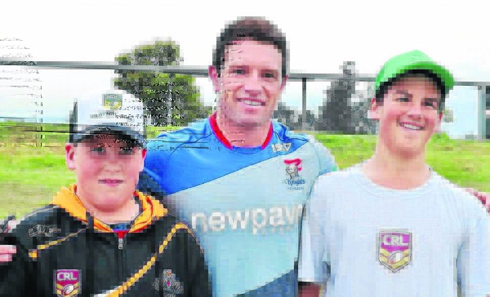 Newcastle Knights legend Danny Buderus (centre) with Cooper and Hunter Dever from Aberdeen who helped out to run the junior league clinic. Photo courtesy Michelle Williams
