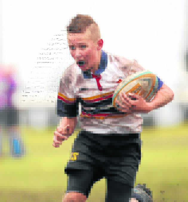  Scone junior rugby union representative Harry Brown playing in the NSW Primary Schools Sports Association State Championships at Kiama on a wet and muddy day last month.