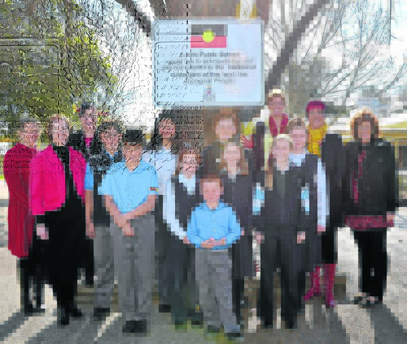 Scone Public School Aboriginal Education Team members and students (back) Melissa Petersen, Kate Mateer, Laurece Godde, Melisa Powell, Merridy Jamieson-Rokobaro, (middle) assistant principal Deborah Fisher, Bailey Whitby, Emily Willetts, Oscar Richardson, Jazz Barry, (front) Isaac Field, Vanessa Kimpton, Jack Shankley, Georgia Stafford and Summer Burnett in front of the school’s new acknowledgement garden.  Absent: April Cox and Tammy Kimpton. 