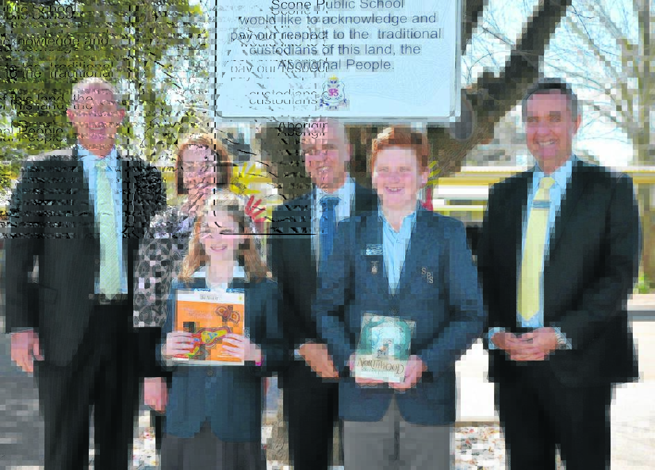 (Back) Member for Upper Hunter Michael Johnsen, Scone Public School relieving principal Deborah Fisher, Minister for Education Adrian Piccoli, NSW Public Schools director Mark Young, (front) Scone Public School captains Georgia Stafford and Oscar Richardson during the minister’s visit on Tuesday.