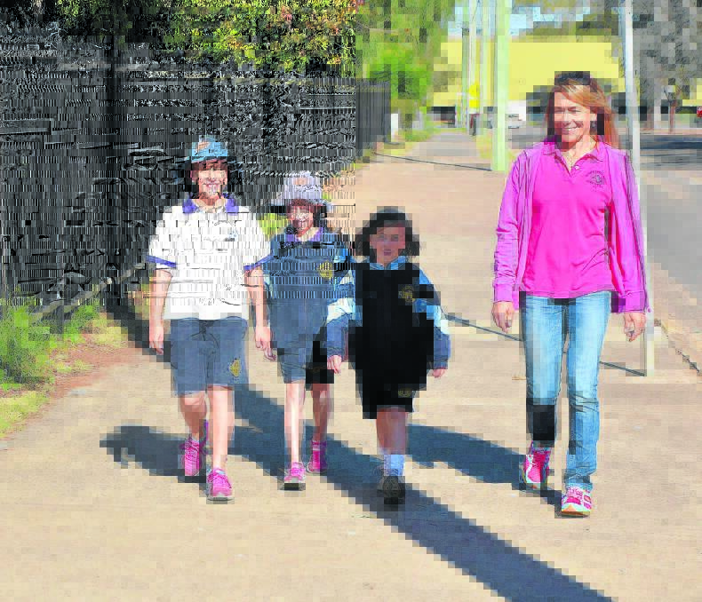 Upper Hunter Shire Council sports participation officer Nicky Western (right) with sisters Georgie, Milly and Skye McRae who walk or cycle to school at St Mary’s Primary in Scone every day.