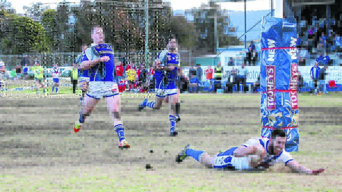 Scone first grade player Joel Harrison smashes over the line after a 90 metre run in Sunday’s clash with Greta-Branxton.
Photo courtesy Hayley Pennell