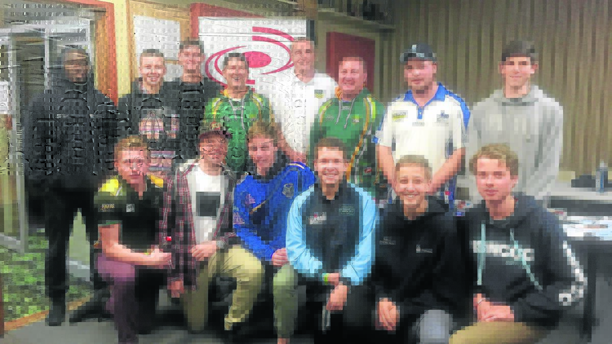 Local junior league players with special guest former West Tigers player Wayne Wigham (back, centre) at the Mates Helping Mates workshop in Aberdeen on Tuesday night. 