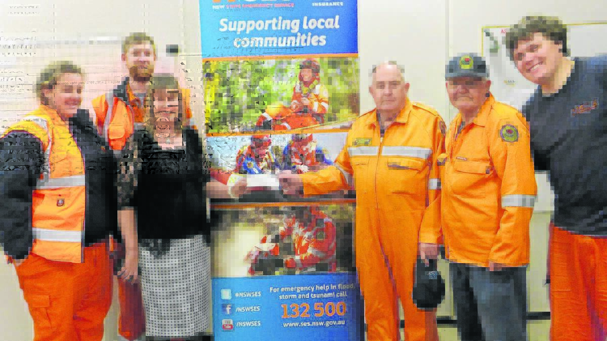Aberdeen SES team members Haylee Dale, Andrew Clarke, Ray Butchard, Mick Batten and Jeff Irwin were delighted to accept a cheque from Aberdeen Highland Games committee member Elizabeth Birch for their help. 