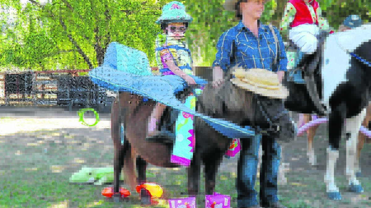Murrurundi and District Pony Club fancy dress winner Samantha Easey with her mum Louise Turner.