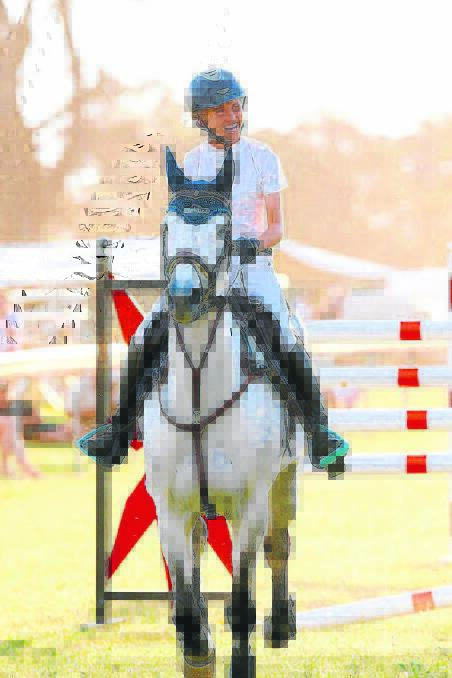 Millie Fisher on Vivianne at the NSW State Championships at Boorowa in October when they jumped 1.55 metres to come third in the Junior Six Bar event. 