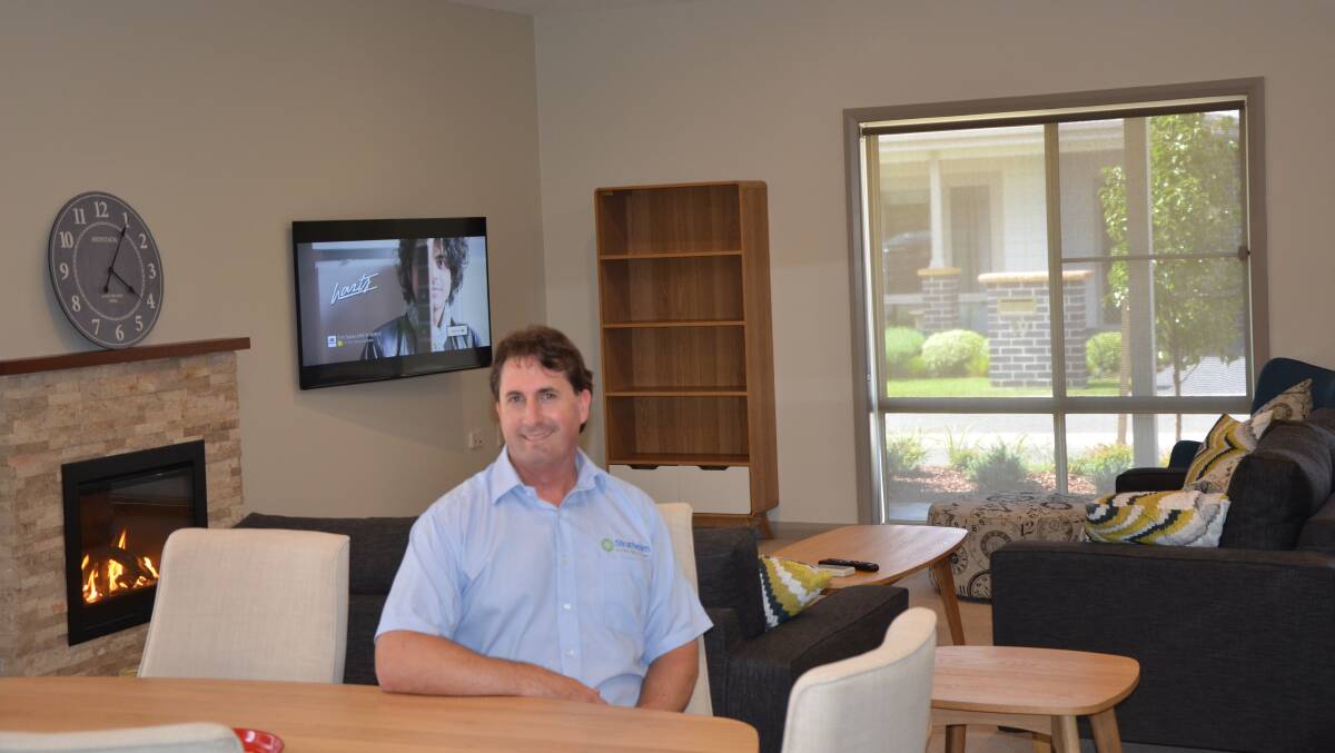 IMPRESSIVE: Strathearn chief executive Matthew Downie inside the display home, which is almost ready to open.
