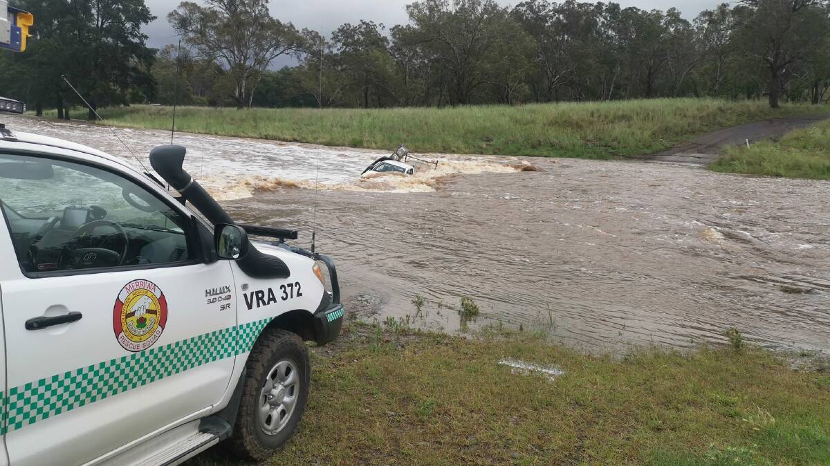 FLOODWATERS: A vehicle submerged beneath floodwaters near Merriwa on Monday, November 22. Picture: Merriwa VRA Rescue Squad