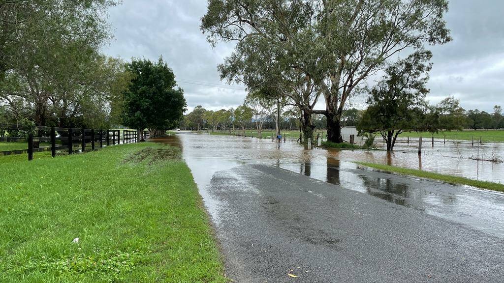 ROUCHEL: Flood waters over Rouchel Road near Aberdeen on Friday, November 26. Picture: Mathew Perry