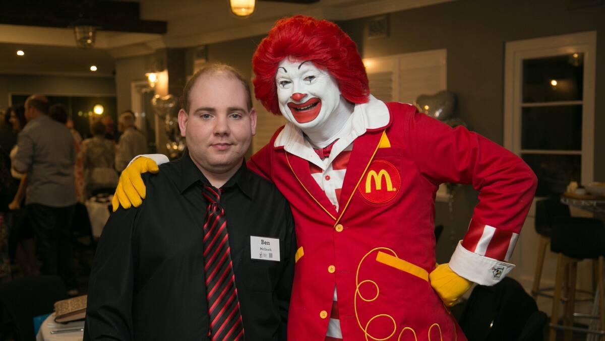 REUNION: Ben McGrath (left) with Ronald McDonald at an event marking the anniversary of the Newcastle Ronald McDonald House at John Hunter Hospital. Picture: Supplied