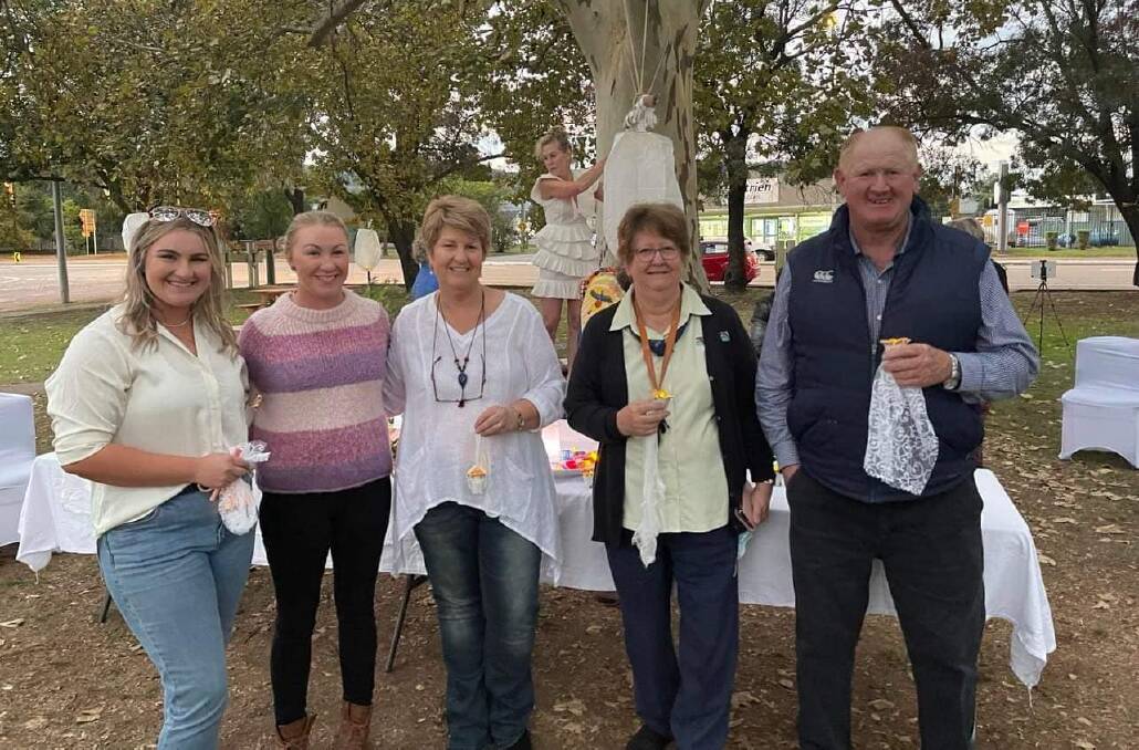 SCONE: Upper Hunter Mayor Maurice Collison (right) and Councillors Lee Watts (centre) and Tayah Clout (second from left) attend a candlelight vigil aiming to raise domestic violence awareness in Scone on Wednesday, May 4. Picture: Upper Hunter Shire Council
