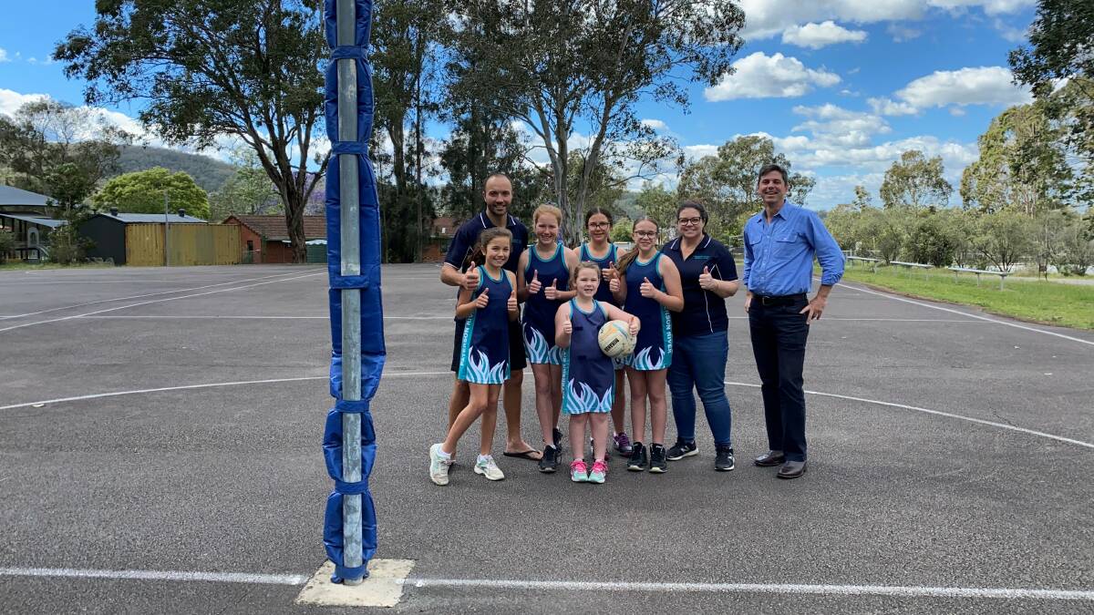 FUNDING: Upper Hunter MP Dave Layzell (R) pictured with members of Paterson River Netball Club which received $10,000 as part of the 2021 Community Building Partnerships Program. Picture: Supplied