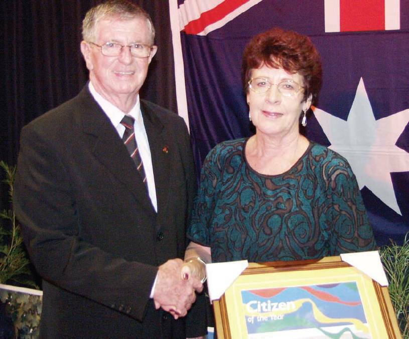 PREVIOUS HONOUR: Pictured at Cessnock's Australia Day awards in 2007, Margaret Albury receives her Citizen of the Year award from then-Mayor of Cessnock, John Clarence.