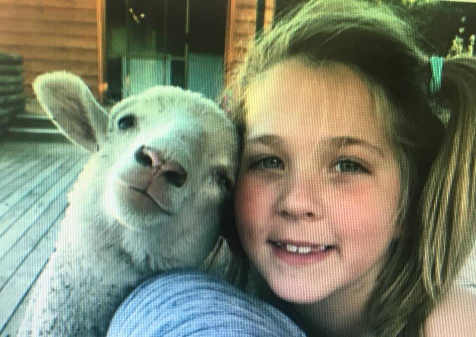 UNITED: Blossy Higgins is happy to have her orphaned Lamby Lamby back home having been missing since October 2018. Photo supplied. 