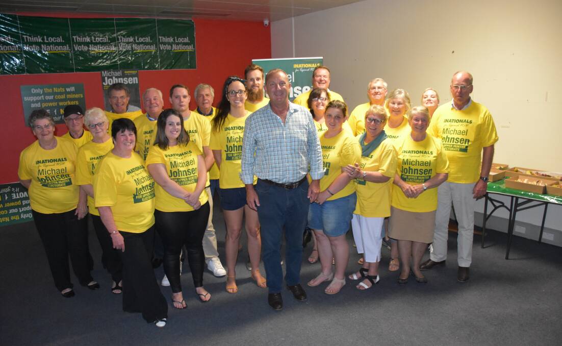 The re-elected member for Upper Hunter Michael Johnsen with his campaign supporters on Saturday night. 