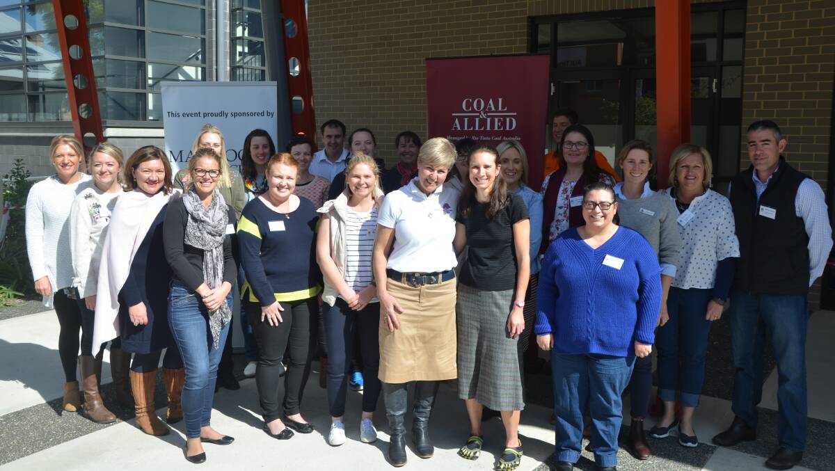 Melbourne University’s Dr Peggy Kern, Where There’s A Will co-founder Pauline Carrigan, Glencore’s Nathan Lane and Coal & Allied’s Andrew Speechly with teachers from Upper Hunter Shire schools on Friday.