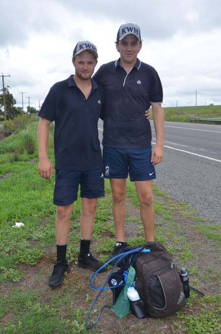 Ed Goff and Harrison Badger on the New England Highway during their Scone to Sydney charity walk.