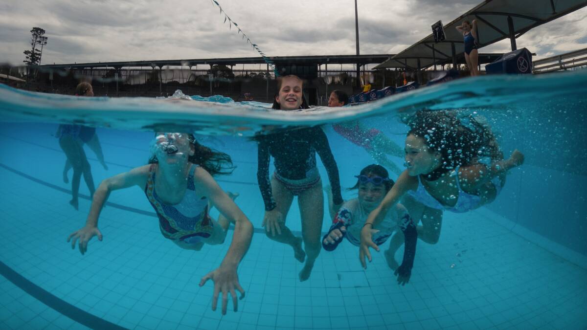 Zara, Olivia, Violet and Hollie cooled off on Thursday at Lambton pool. Picture by Marina Neil