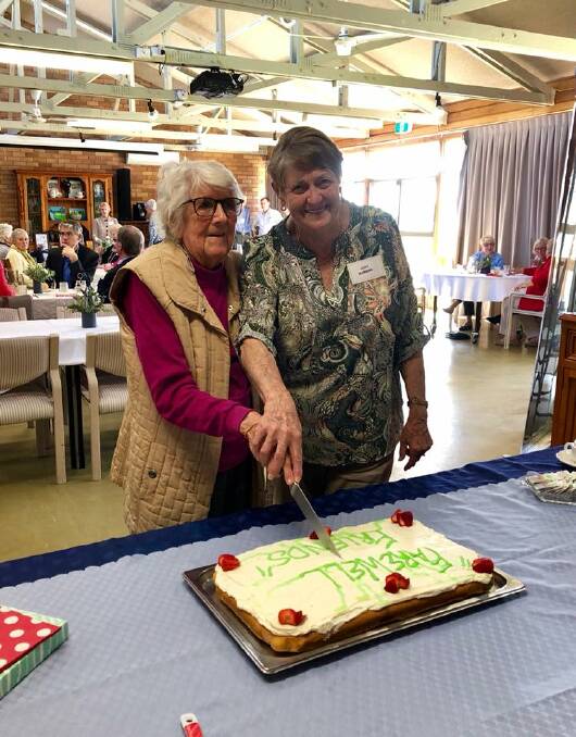 THANK YOU: Original members Joan Keevers and Judy Manning cut the cake.