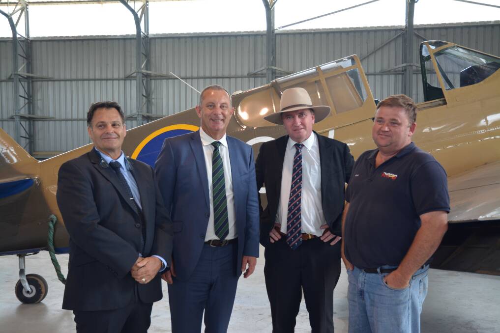 TOURISM BOOST: Upper Hunter Shire Council Mayor Wayne Bedggood, Upper Hunter MP Micheal Johnsen, New England MP Barnaby Joyce and Pay's Air Service managing director Ross Pay at Pay's Air Service on Friday.