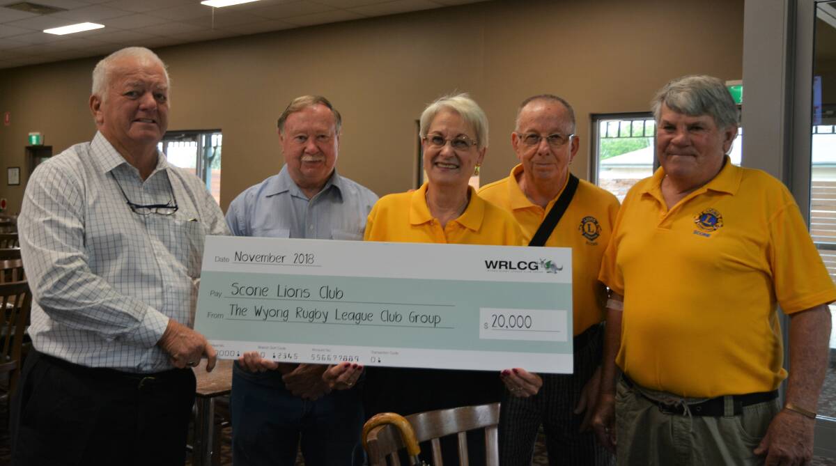 GENEROUS:  Wyong Rugby League Club Group vice chairman Bob Wells with Scone Lions members Ray Moore, Maria Musumeci, John Musumeci and Geoffrey Pund.