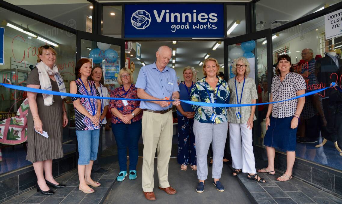 OPEN FOR BUSINESS: St Vincent de Paul Maitland/Newcastle president John McKendry officially opened the store with volunteers on Monday morning.